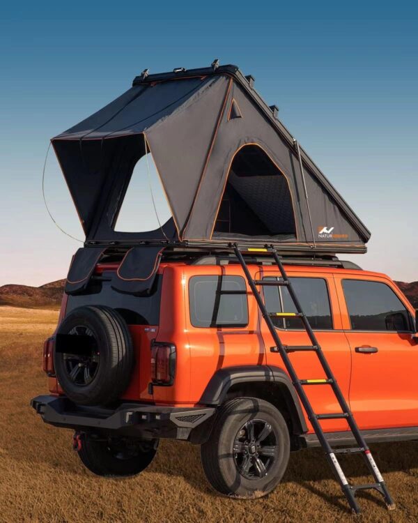 Naturnest Orion Mini Hard Shell Rooftop Tent mounted on SUV