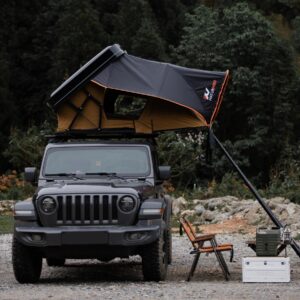 Naturnest Sirius 2 Clamshell Rooftop Tent mounted on SUV