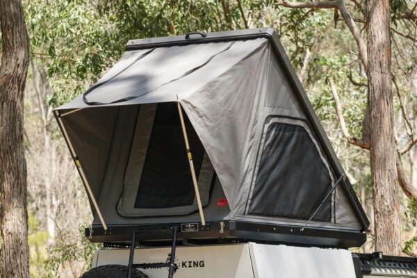 Naturnest Sirius 3 Clamshell Rooftop Tent mounted on SUV