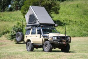 Naturnest Sirius 3 Clamshell Rooftop Tent mounted on SUV