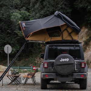 Naturnest Sirius 2 Clamshell Rooftop Tent mounted on SUV