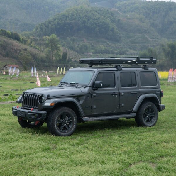 Naturnest Sirius 2 Clamshell Rooftop Tent mounted on SUV